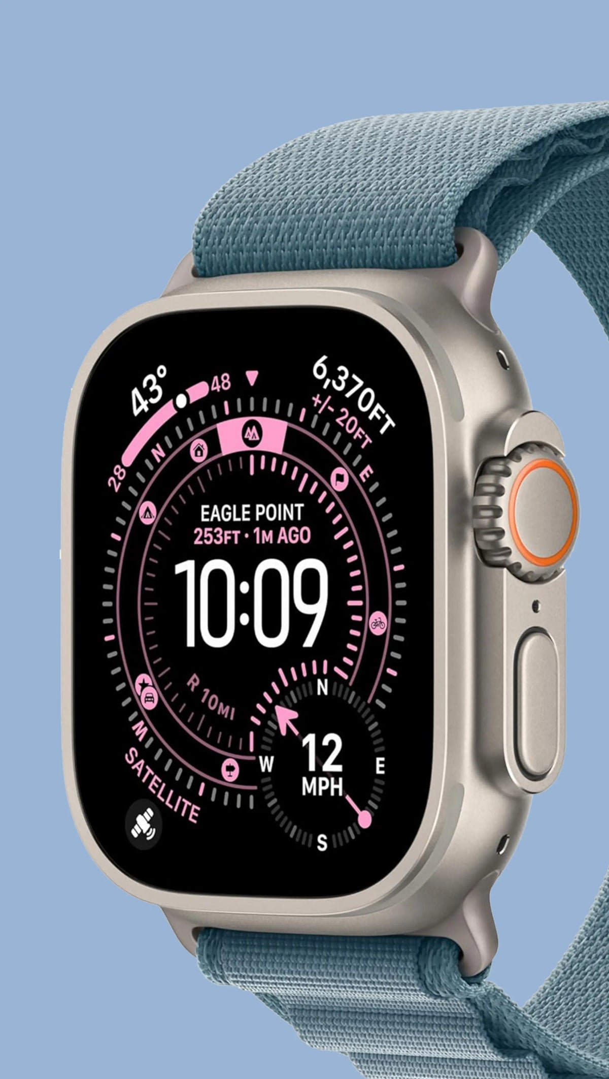 Apple Watch Ultra with blue sport loop band displaying compass and navigation data on black screen face